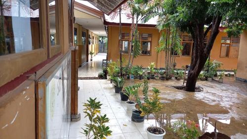 GMIT 7 Oebufu Elementary School, Private School | We provide Indonesia infrastructure map on various property sectors and data. Access property listings, infrastructure developments, news, and valuable transaction data for informed decisions.
