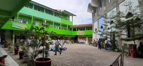 Muhammadiyah 19 Junior High School, Private School | We provide Indonesia infrastructure map on various property sectors and data. Access property listings, infrastructure developments, news, and valuable transaction data for informed decisions.